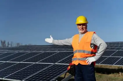 Home solar setup showing panels, inverter, battery, and grid meter connection